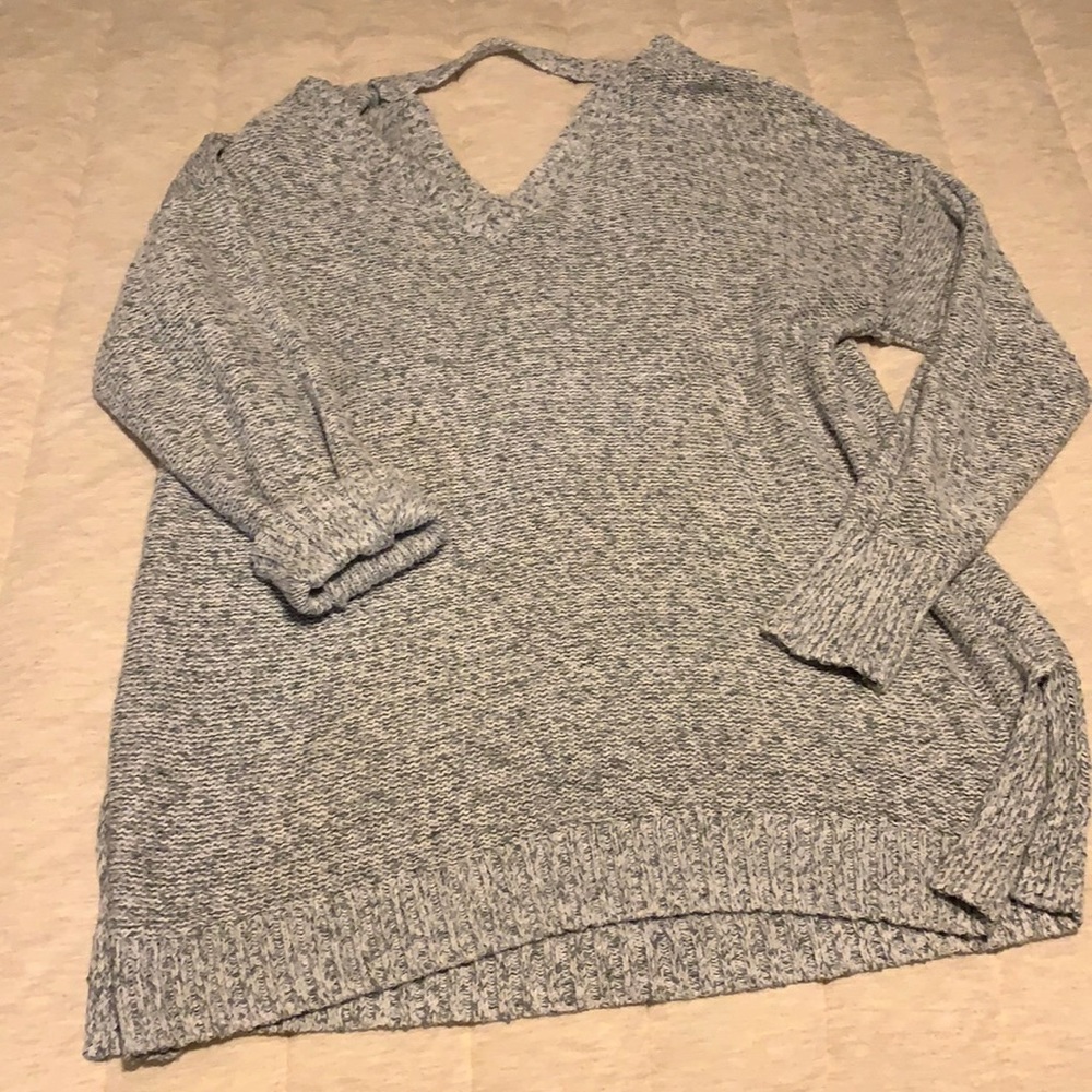Tunic style off the shoulder type sweater